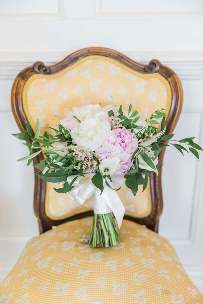 Chelsey bridal bouquet on yellow chair