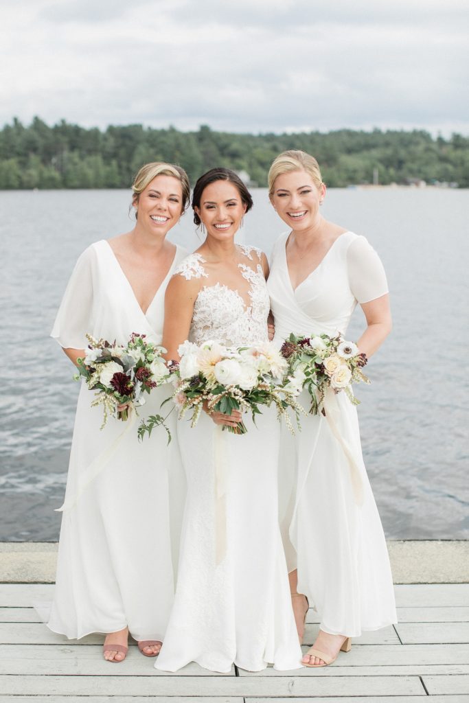 Prita and Mac Twin Lake Village wedding portrait with two bridesmaids
